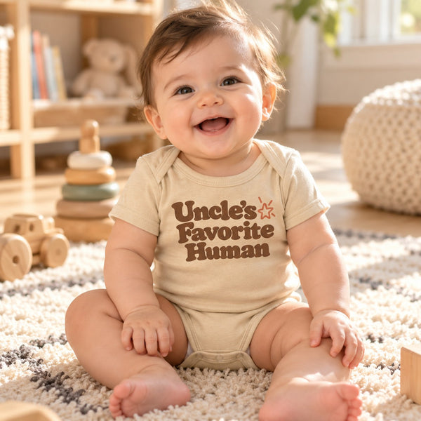 Baby wearing the Uncle's Favorite Human baby bodysuit