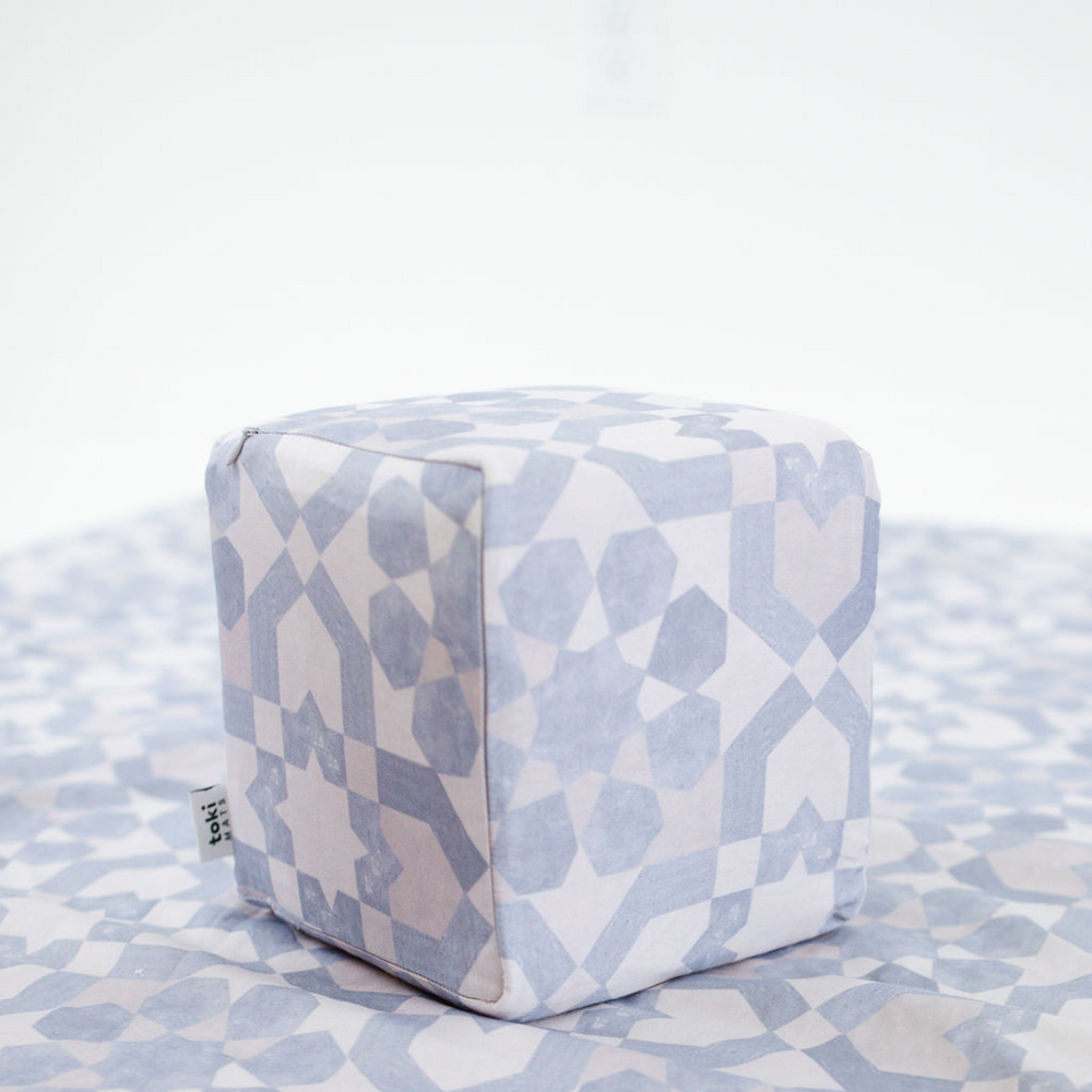 Blue Tile Play Cube for babies, featuring a colorful design and engaging textures for sensory play and development.