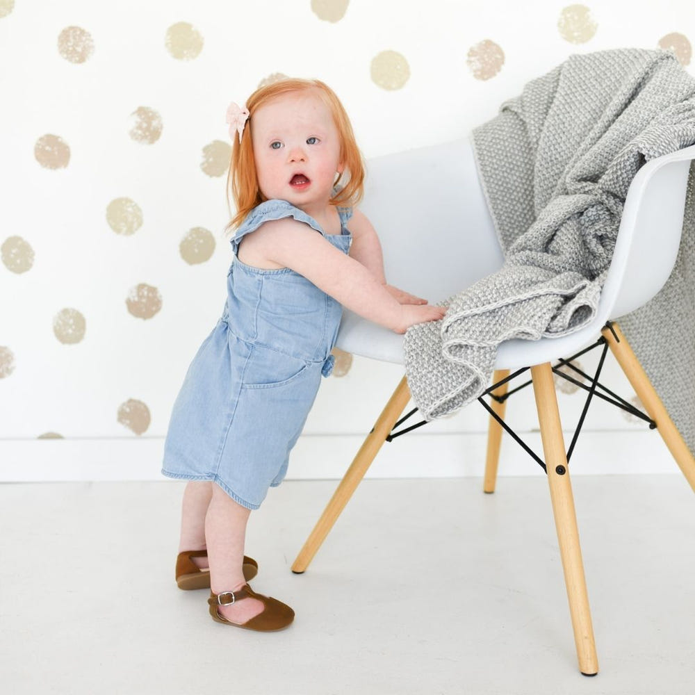 Brown Mary Jane hard sole baby shoes - stylish and comfortable footwear for infants.