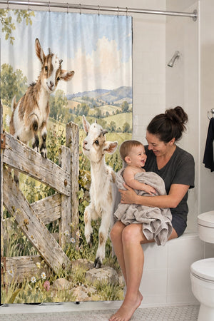 Mom holding her baby on the tub edge next to the Baby Goats Farm shower curtain