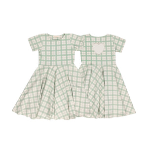 Sweetheart Twirl Dress in Fern Plaid, made of organic cotton jersey, perfect for baby swimwear. Angle 8 view.