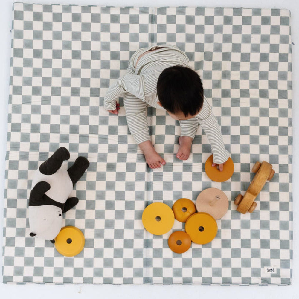 Checker Matcha Organic Cotton Mat for babies, perfect for playtime and safe lounging.