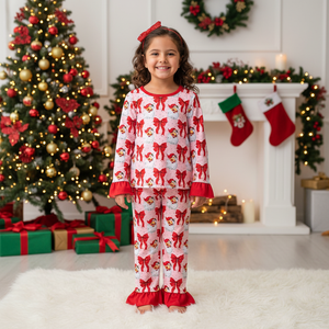 Red Santa Bows pajama set for babies, perfect for festive sleepwear and holiday celebrations.