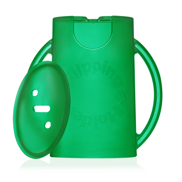 Flipping Holder DELUXE with lid in green for convenient nursing and feeding.