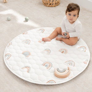 Rainbow play mat with non-slip bottom, perfect for safe and fun playtime for babies.