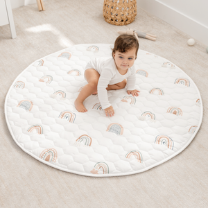 Rainbow play mat with non-slip bottom, perfect for safe and fun baby playtime. Angle 7 view.