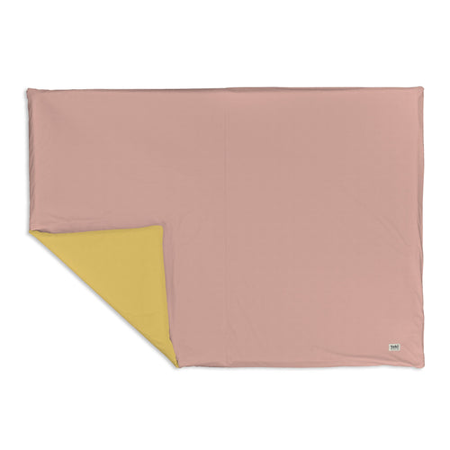 "Tutu + Daisy Organic Cotton Mat for babies, featuring a playful design, perfect for safe and stylish playtime."