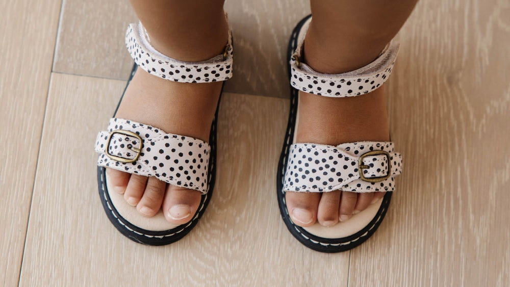Dottie Lug Sole Sandal for babies in stylish design, perfect for comfort and support during outdoor adventures.