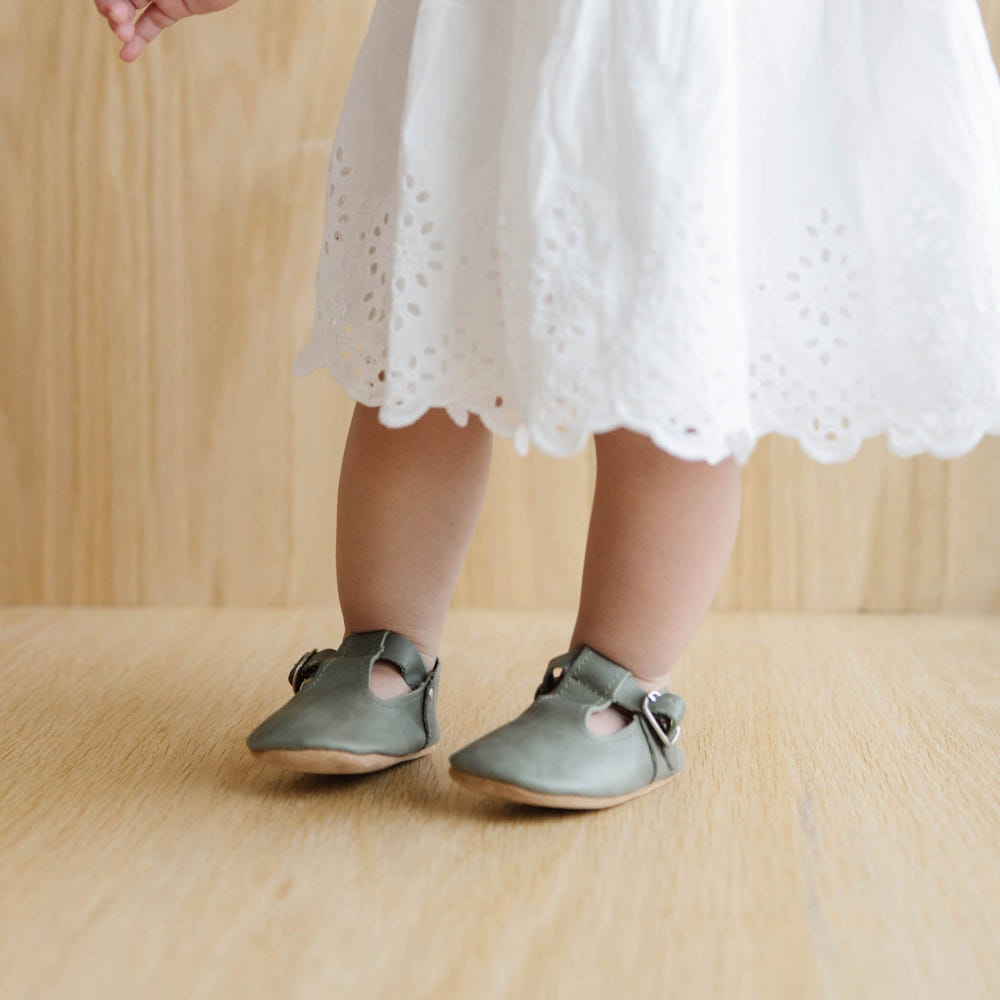 Sage T-Strap Mary Jane soft sole baby shoes in a stylish design, perfect for little feet.