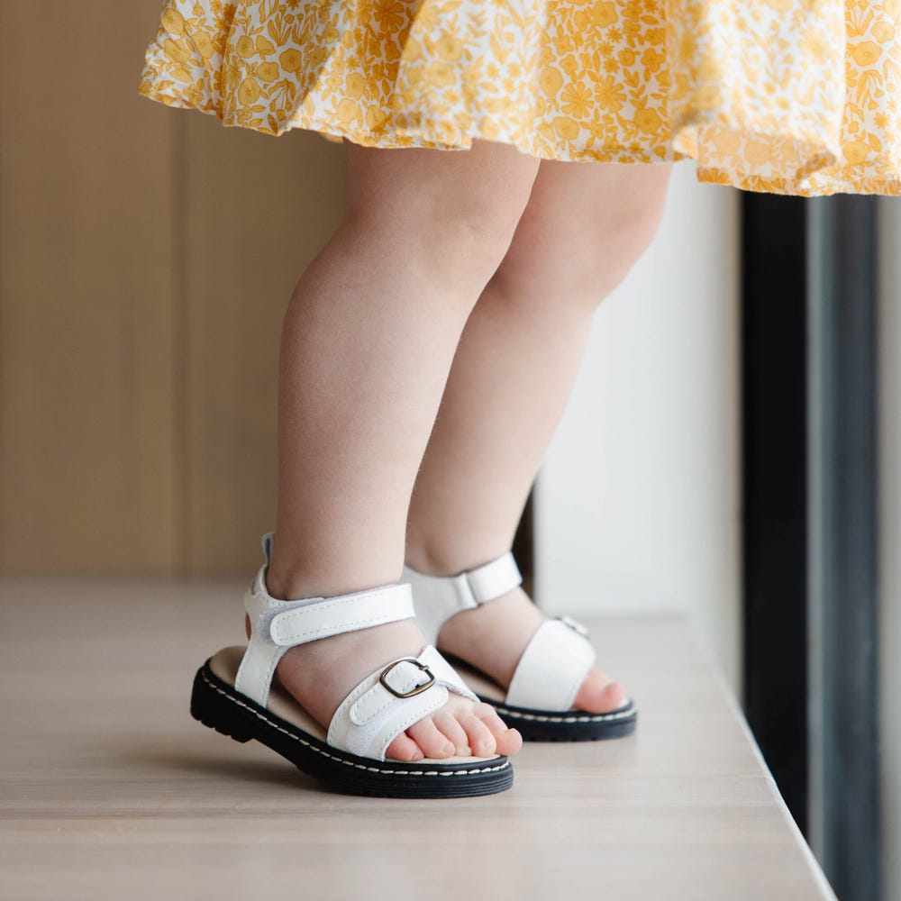 Snow Lug Sole Sandal for babies, featuring a durable design and comfortable fit, perfect for summer outings.