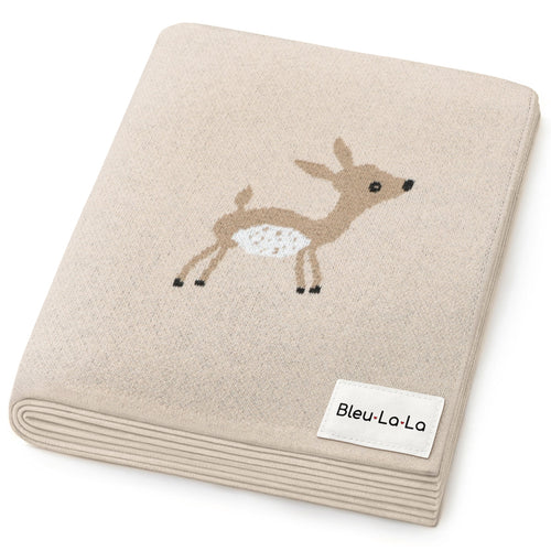 Luxury cotton deer knit swaddle baby blanket in soft colors, perfect for cozying up your little one.