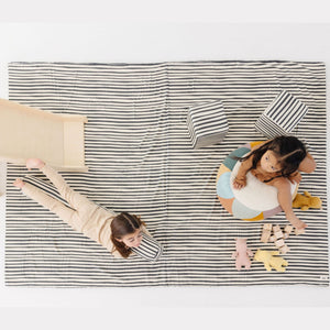 Bold Stripe Organic Cotton Mat for babies, featuring vibrant colors and a soft texture, perfect for playtime.