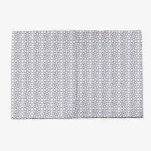 Blue Tile Vegan Leather Play Mat at angle 13, perfect for safe and stylish baby playtime.