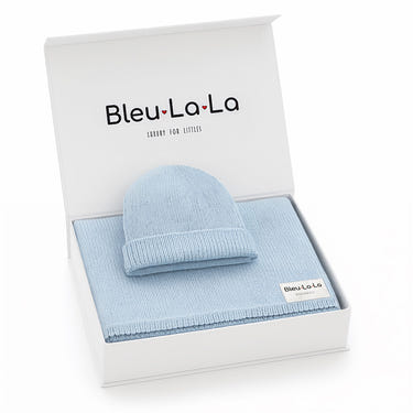 Luxe Collection organic cotton baby blanket and hat set in gift box, perfect for cozy comfort and stylish gifting.