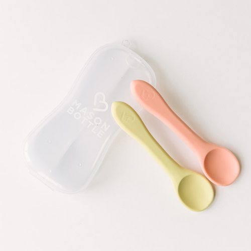 Silicone spoon set for babies, featuring soft, safe utensils for easy feeding. Angle 2 view showcasing design and colors.