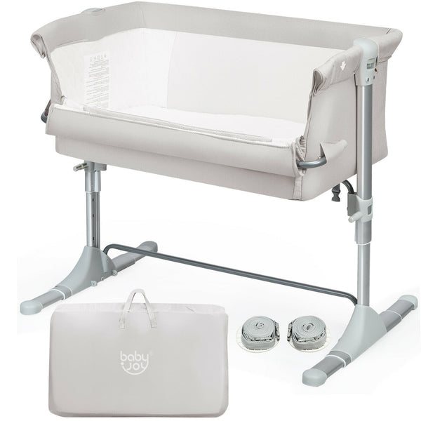 Portable baby bed side sleeper bassinet crib with carrying bag, angled view showcasing design and functionality.