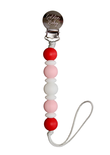 "Lauren Clip Valentine's Day pacifier clip in pink and red heart design for stylish baby accessories."