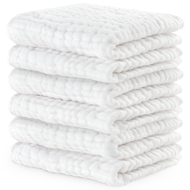 Soft white muslin washcloths for babies, perfect for gentle cleaning and bath time.