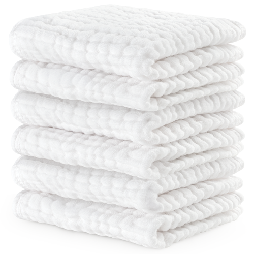 Soft white muslin washcloths for babies, perfect for gentle cleaning and bath time.