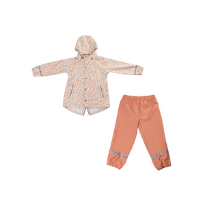 Baby rain pants in sunset color, angle view, perfect for keeping little ones dry and stylish during rainy days.