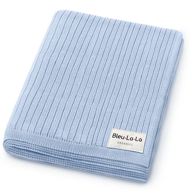 Organic ribbed knit cotton baby blanket in soft, soothing colors for cozy comfort and warmth. Perfect for infants.