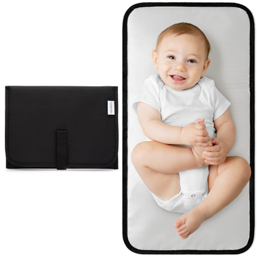 Compact black changing pad for babies, perfect for on-the-go diaper changes.