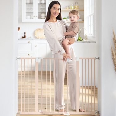 Blush baby safety gate for secure home environments, ensuring child safety and peace of mind.