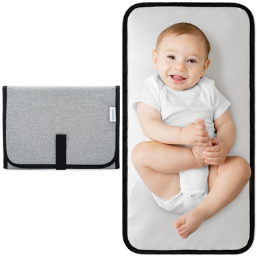 Compact grey changing pad for babies, perfect for on-the-go diaper changes.