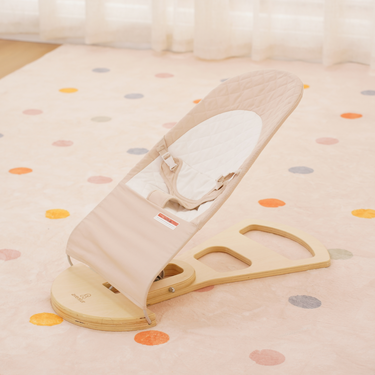 Foldable Fir Baby Bouncer for indoor use, providing comfort and support for your little one.