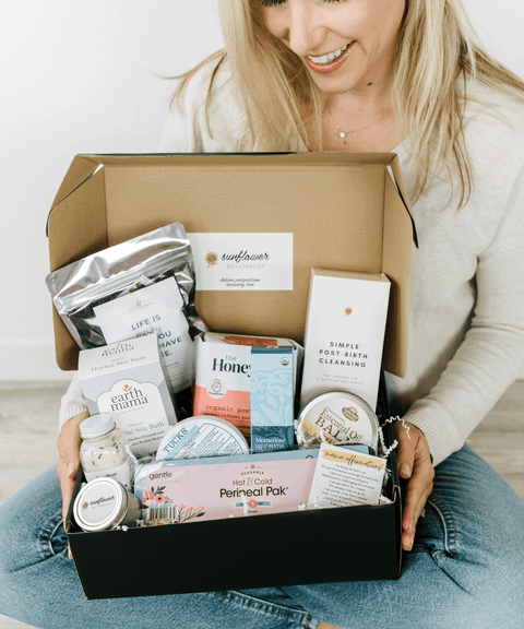 Deluxe Postpartum Recovery Box for new moms, featuring essential baby gift items for soothing and support.