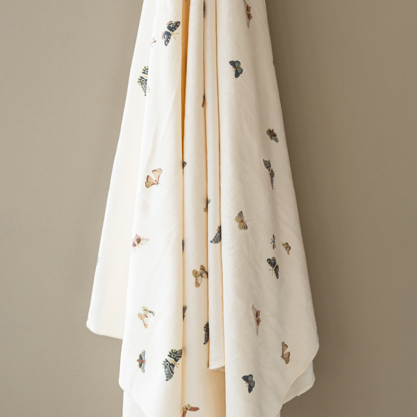 Minky Stretch Luxe Swaddle Blanket in soft fabric, perfect for keeping your baby cozy and comfortable.