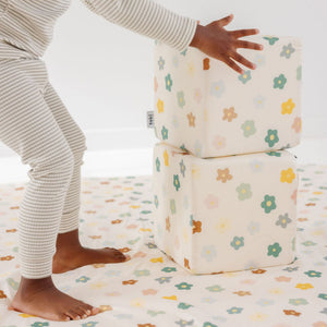 Colorful Playful Posies Play Cube from an angled view, designed for engaging baby playtime and development.