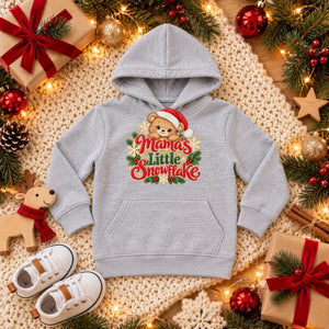 Mama's Little Snowflake toddler hoodie in heather grey, Christmas flat lay