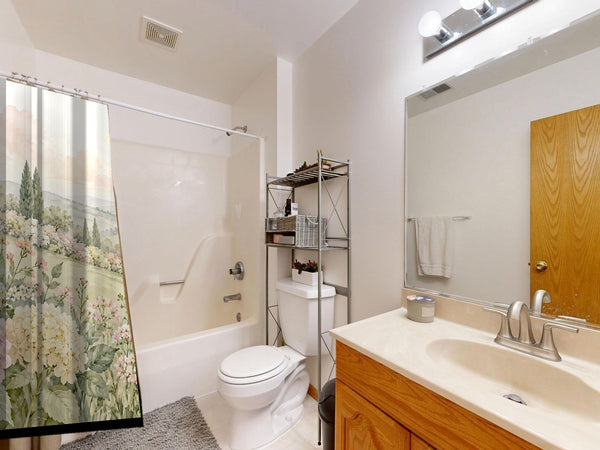 Hydrangea Garden shower curtain on a tub shower combo in an American family bathroom