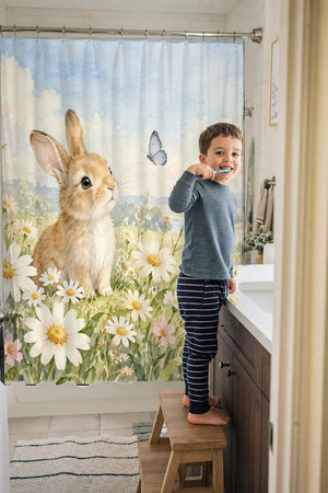 Child brushing teeth in a family bathroom with the Daisy Meadow Bunny shower curtain