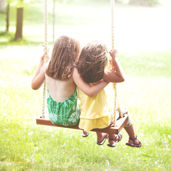 Classic Ash DOUBLE Bench Swing for outdoor playsets, showcasing a stylish angle 2 view. Perfect for family relaxation.