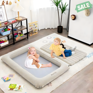 2-in-1 inflatable toddler travel bed set with electric pump in gray, perfect for on-the-go comfort.