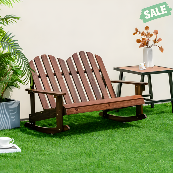 Brown 2-person Adirondack rocking chair with slatted seat, perfect for kids' outdoor seating. Angle view.