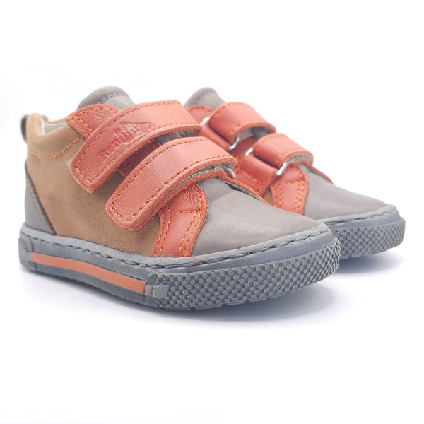 Boys double velcro shoes in orange and brown, perfect for stylish and comfortable playtime.