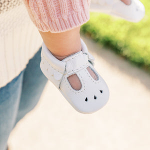 Newborn bright white Mary Jane baby shoe, angle 5 view, perfect for stylish infant footwear.