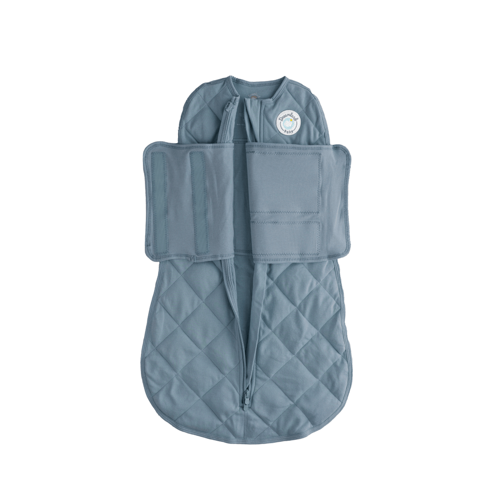 Dream Weighted Sleep Swaddle for babies, promoting restful sleep and comfort in a cozy design.