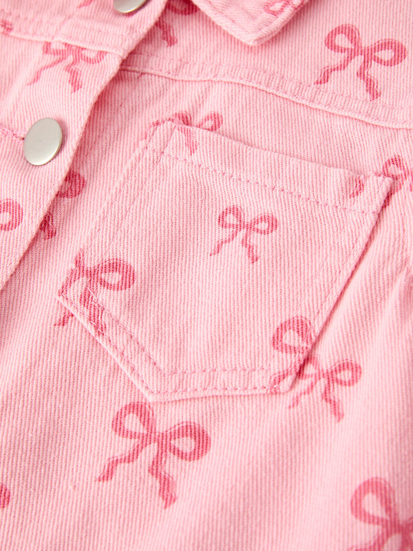 Pink fall girls' butterfly print denim top, angle view showcasing stylish design and vibrant colors.