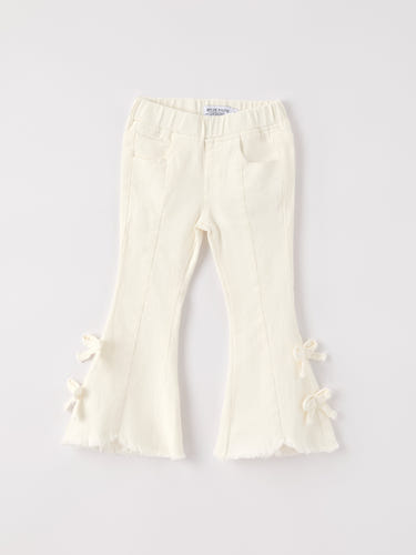 Charming white denim baby pants with cute bows for fall and Christmas celebrations.