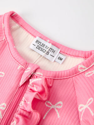 Christmas Bow Pink Romper with Hat for babies - stylish outfit, perfect for festive occasions. Angle 3 view.