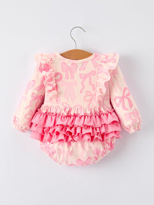 Girls pink bow print long sleeves romper, angle view showcasing cute design and comfortable fit for babies.