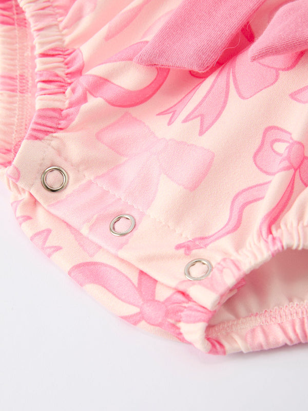 Girls pink bow print long sleeves romper, stylish and comfortable for infants, showcased from angle 5.