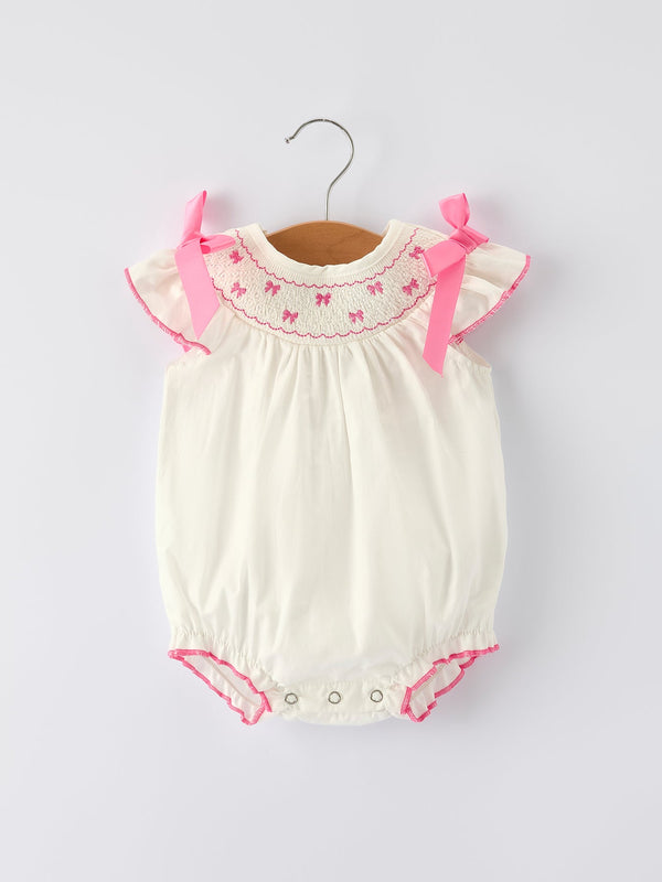 Fall white baby girls romper featuring pink bow embroidery, perfect for stylish and cozy autumn outfits.