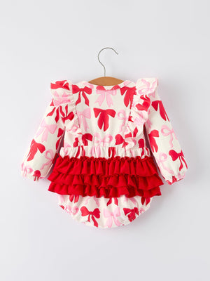 Baby girls' Valentine's bow print long sleeve ruffle romper, angle 2 view, perfect for festive occasions.