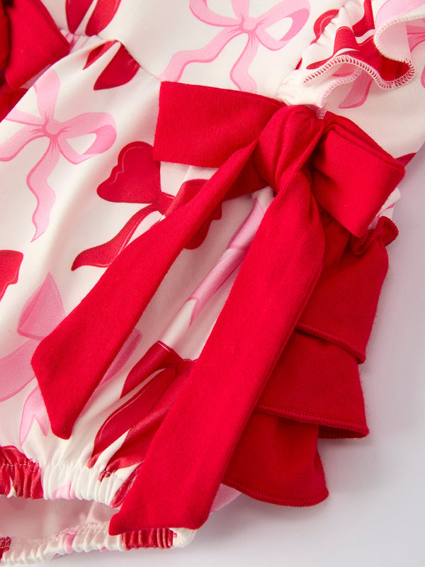 Baby girls' Valentine's bow print long sleeve ruffle romper, stylish and adorable for special occasions.