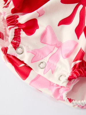 Baby girls' Valentine's bow print long sleeve ruffle romper, stylish and cute for special occasions. Angle 5 view.
